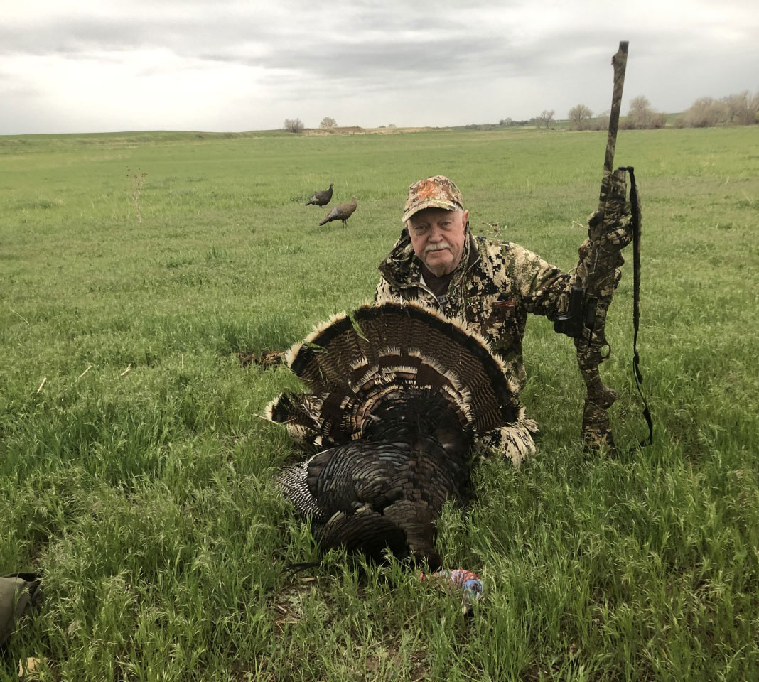 Merriam’s turkey taken in Wyoming by Larry Newton weighing 22lbs with 8.5” beard and 0.5” spurs.